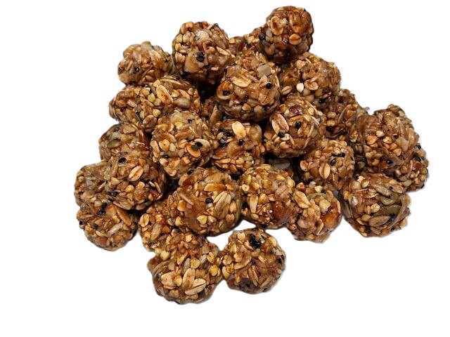 Freshly hand-rolling Buki Bites energy bites in the kitchen